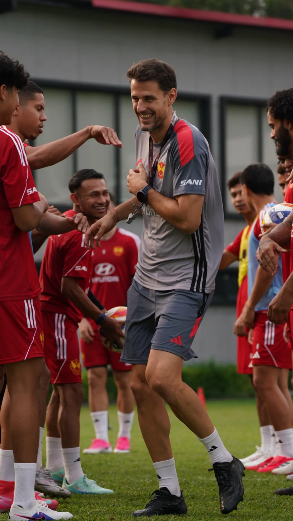 Joel Donés sharing a laugh with Selangor FC players